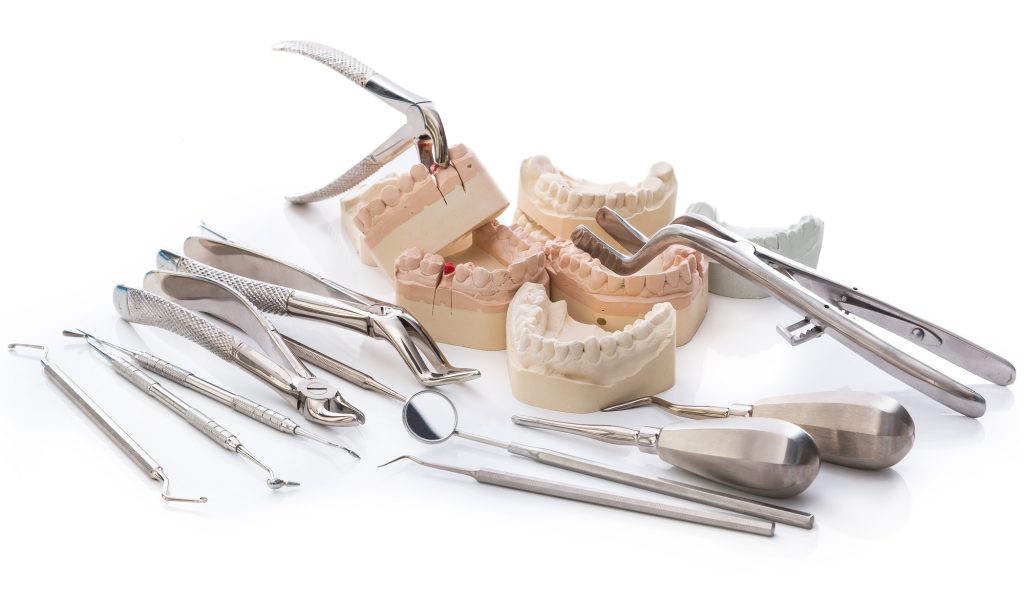 Dental prosthetics including dentures, bridges, and implants on display